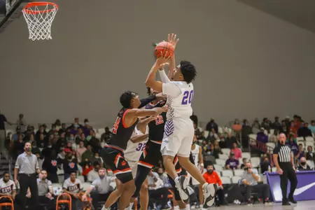 Coryon Mason puts up a shot in the paint against SHSU