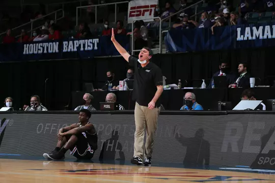 Coach Golding coaching in the SLC semifinal