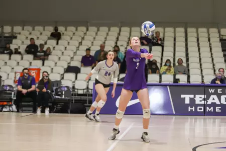 Harris passes a ball in a game against Northwestern St.