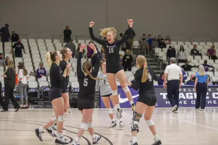 Braden Bossier (15) and the Wildcats celebrate a point vs. Central Arkansas