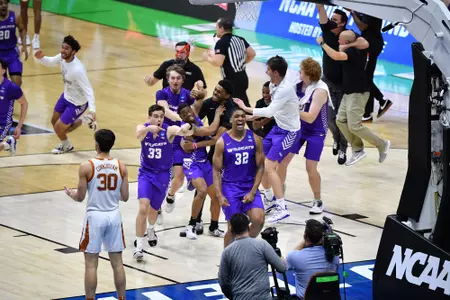 INDIANAPOLIS, IN - MARCH 20: The Abilene Christian Wildcats play the Texas Longhorns in the first round of the 2021 NCAA Division I Men’s Basketball Tournament held at Lucas Oil Stadium on March 20, 2021 in Indianapolis, Indiana. Abilene Christian defeated Texas 53-52. (Photo by Jamie Sabau/NCAA Photos via Getty Images)
