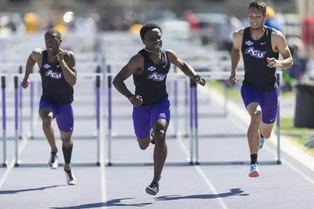 Jamal January and teammates finish the sprint hurdles at the Wes Kittley Invitational