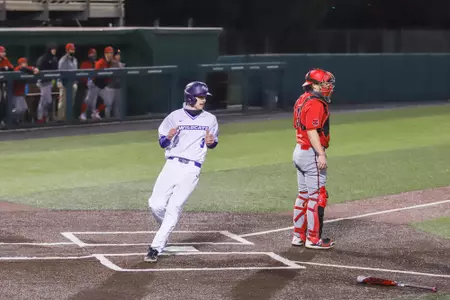 Mitchell Dickson scores a run vs. Arkansas State