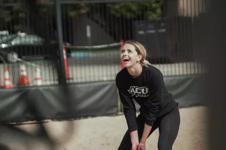 Brea Box passes during beach practice