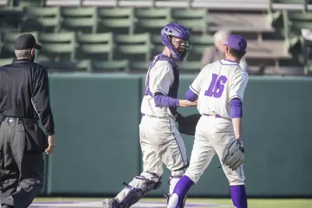 Mitchell Dickson celebrates a play with pitcher Adam Stephenson