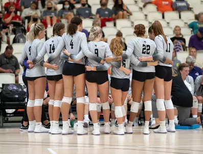 VB team huddle during a timeout