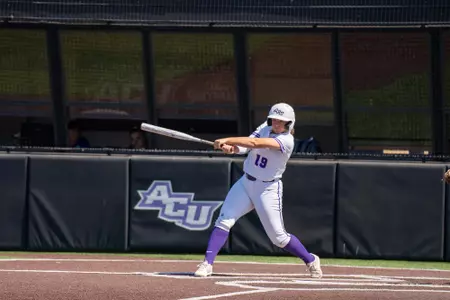 Calie Burris at the plate during a fall scrimmage 2021