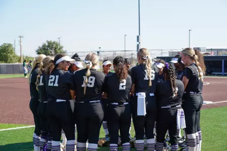 SB team prayer prior to a fall game 2021