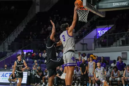 Leo Bettiol goes up for a bucket in a win over McMurry in Moody Coliseum