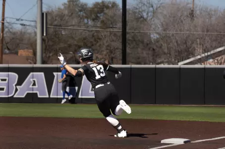 Avery Miloch rounds first after hitting a homerun at Poly Wells Field