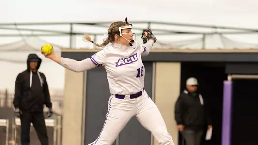 Riley White pitches at Poly Wells Field