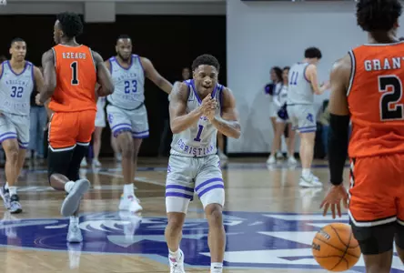Damien Daniels claps his hands as he gets back on defense in a game against Sam Houston at Moody Coliseum