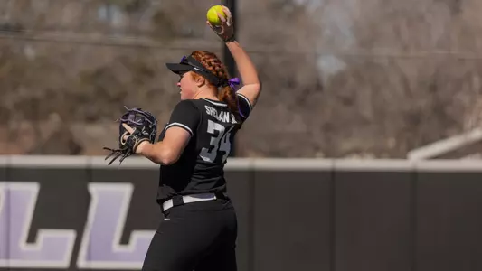 Sammie Shelander warms up at first base.