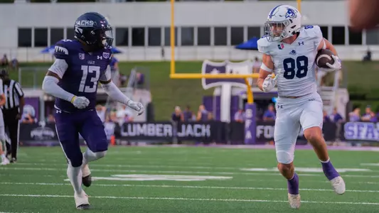 Jed Castles runs with the ball against Stephen F. Austin in 2023