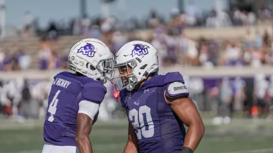 Nehemiah Martinez and JJ Henry celebrate against Central Arkansas on Oct 5, 2024