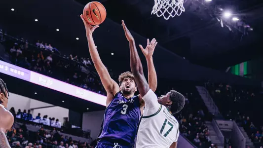 Leonardo Bettiol shoots over a Baylor defender