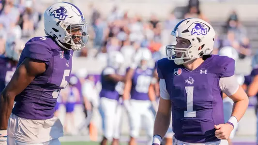 Maverick McIvor and Tristan Golightly celebrate a touchdown vs. North Alabama