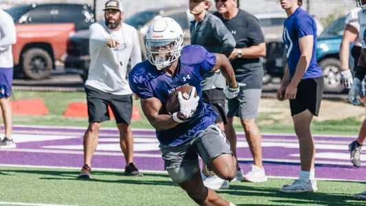 Sam Hicks runs during practice on August 14, 2024