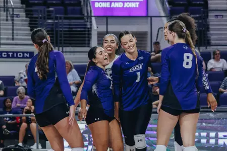 Delanna Harper and other teammates