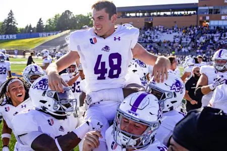 Ritse Vaes being carried off the field after his game-winning field goal on Sept 14, 2024