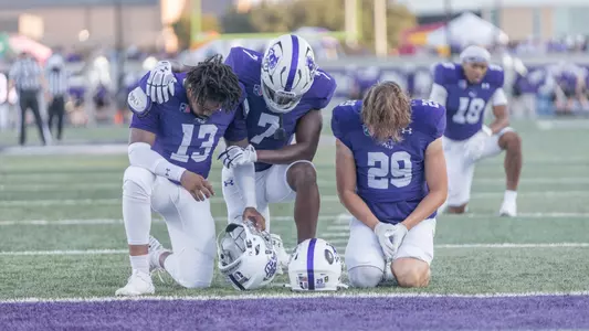 ACU football players Kyron White,