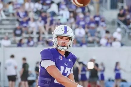 Trevor Baker throws a pass during warm-ups before ACU plays Idaho on September 21, 2024