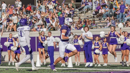 ACU fans cheer as Jed Castles scores a touchdown in a 2023 game vs Tarleton