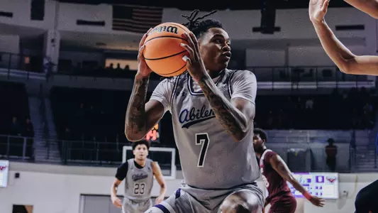 Christian Alston pump fakes against McMurry University.