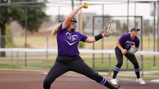 ACU softball player throws a pitch during a fall game in 2024