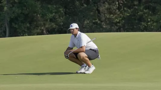 Preston Cooper examines the course at the Trinity Forest Invitational in Dallas, Texas on Oct. 7, 2024.