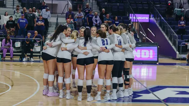 ACU volleyball huddles in a 3-2 loss to Tarleton State at Moody Coliseum on Oct. 18, 2025.