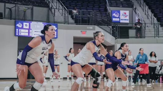 Rachel Koss, Courtney Church and Brennan Ramirez get set during a 3-0 loss to Tulsa at Moody Coliseum on Sept. 15, 2025.
