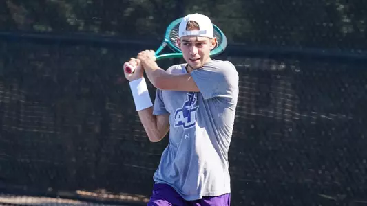 Merse Deli hits a ball during practice in fall 2025