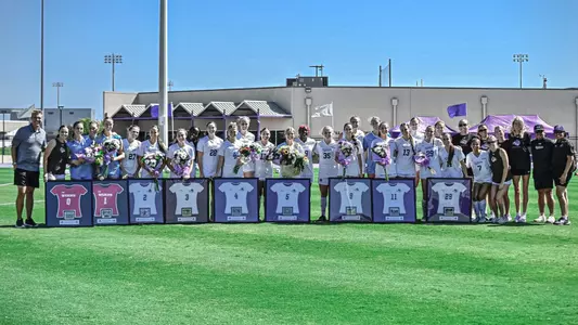 ACU women's soccer's nine seniors pose for a picture on Senior Day