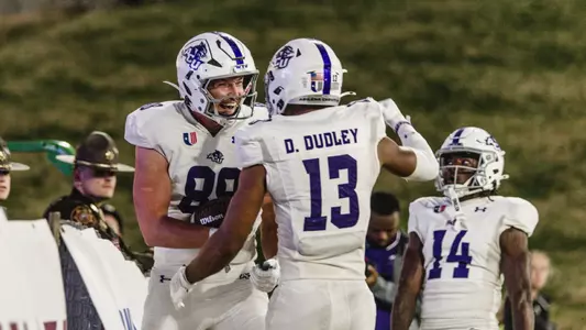 Jed Castles and Dallas Dudley celebrate a two-point conversion at Eastern Kentucky on November 15, 2025