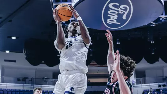 Bradyn Hubbard drives to the basket against Omaha on November 6, 2025