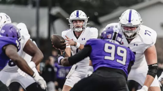 Stone Earle catches a snap versus Central Arkansas on November 22, 2025