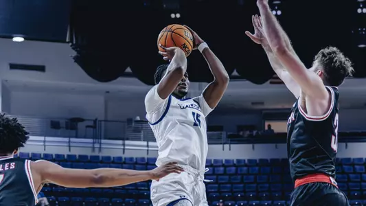 Bradyn Hubbard shoots over a defender against Omaha on November 6, 2025