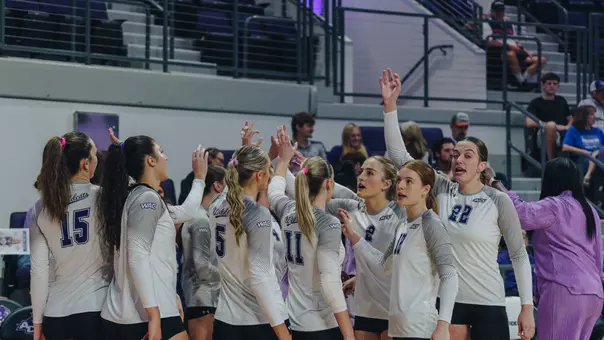 ACU volleyball huddles during a 3-2 loss to Tarleton State at Moody Coliseum on Oct. 18, 2025.