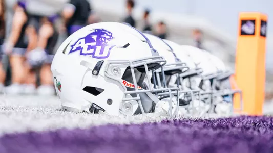 ACU football helmets lined up before a home game in 2025