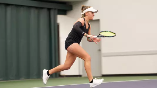 Maria Cascos receives a ball in Abilene Christian women's tennis' matchup with New Mexico State at the Judi and Cecil Eager Tennis Pavilion on Sunday, Jan. 26, 2025.