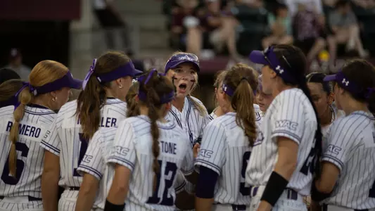 ACU softball team huddles up at Texas A&M
