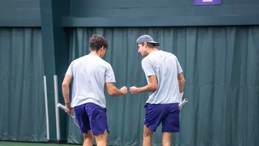 Merse Deli and Dennis Dutiné celebrate during ACU men's tennis' matchup with Trinity at the Teague Center on Feb. 16, 2025.