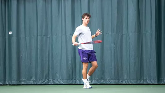 Ethan Scribner takes a swing in ACU men's tennis' match against Trinity at the Teague Center on Feb. 16, 2025.