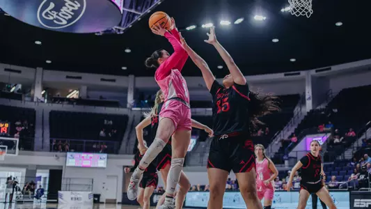 Bella Earle attempts a shot in ACU women's basketball's matchup with Southern Utah on Saturday, Feb. 8 at Moody Coliseum.