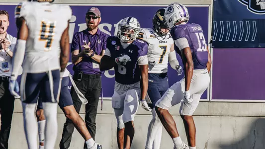Sam Hicks and Blayne Taylor celebrate a touchdown vs Northern Arizona
