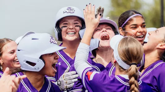 Catrin Hoffman celebrates her walk-off hit versus Utah Tech