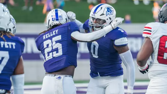 Izaiah Kelley and Darius Moore celebrate after a play vs UIW on September 16, 2023