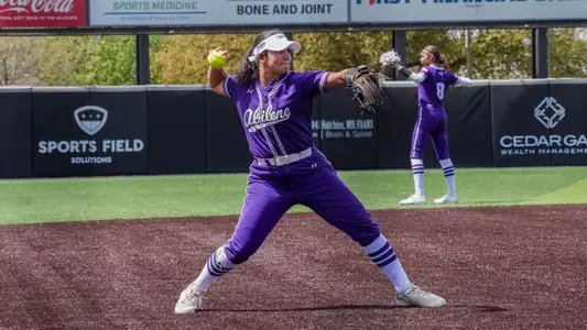 Miranda Lista throws a ball between innings on March 29, 2025