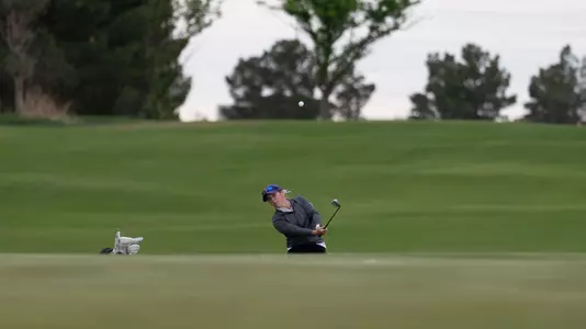 Ryann Honea chips a shot at the NCAA Lubbock Regional at The Rawls Course on May 4, 2025.